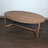 Table Basse en Bois Rouge – Forme Ovale Élégante